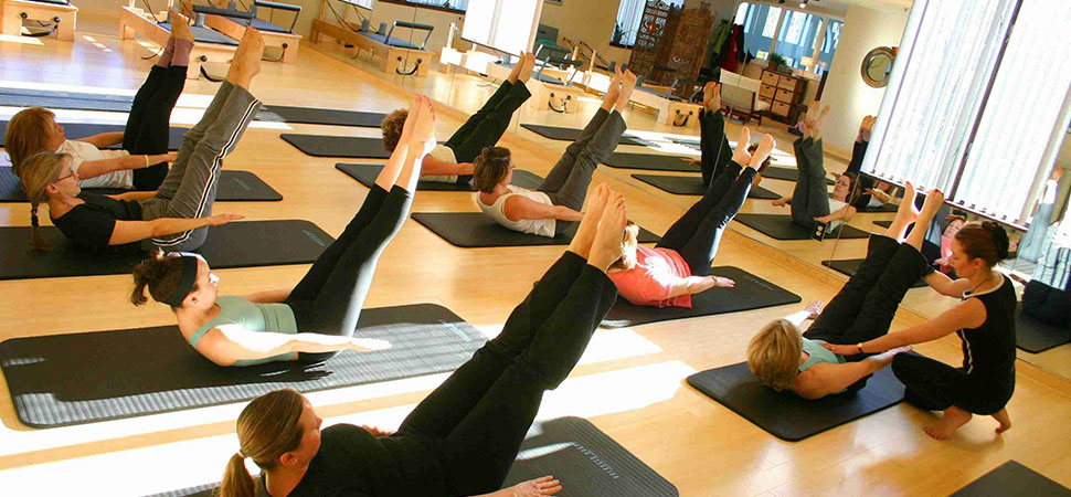 Cours collectif Pilates mat femmes